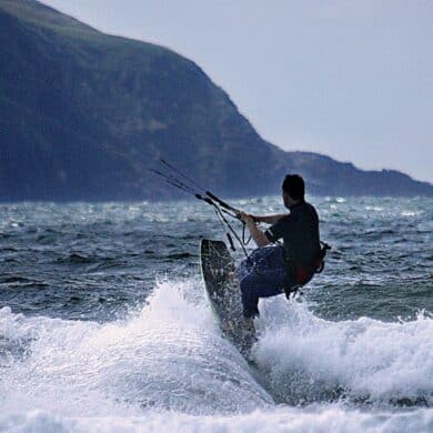 A break in the weather assured Thomas Howard a great drive on tge waves at Castlegregory .Photo: Valerie O'Sullivan