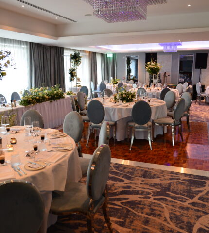 Professional photo of Garden Room set for a wedding meal